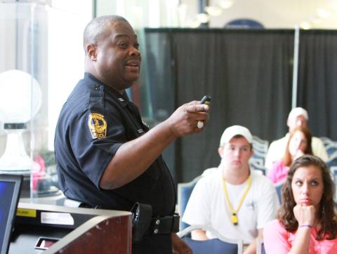 Officer presents wellness and safety at New Student Orientat