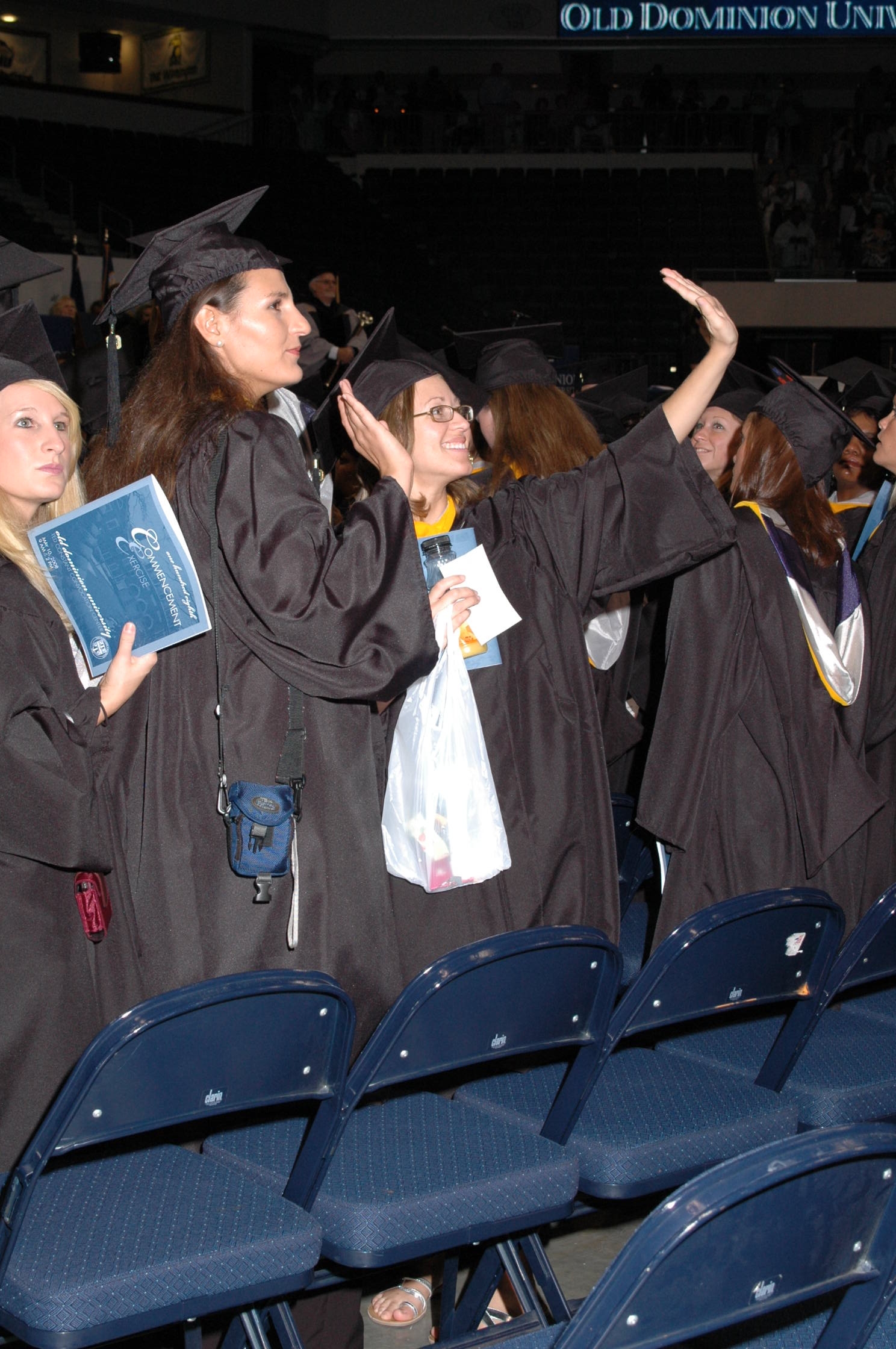 Graduates Wave to Family