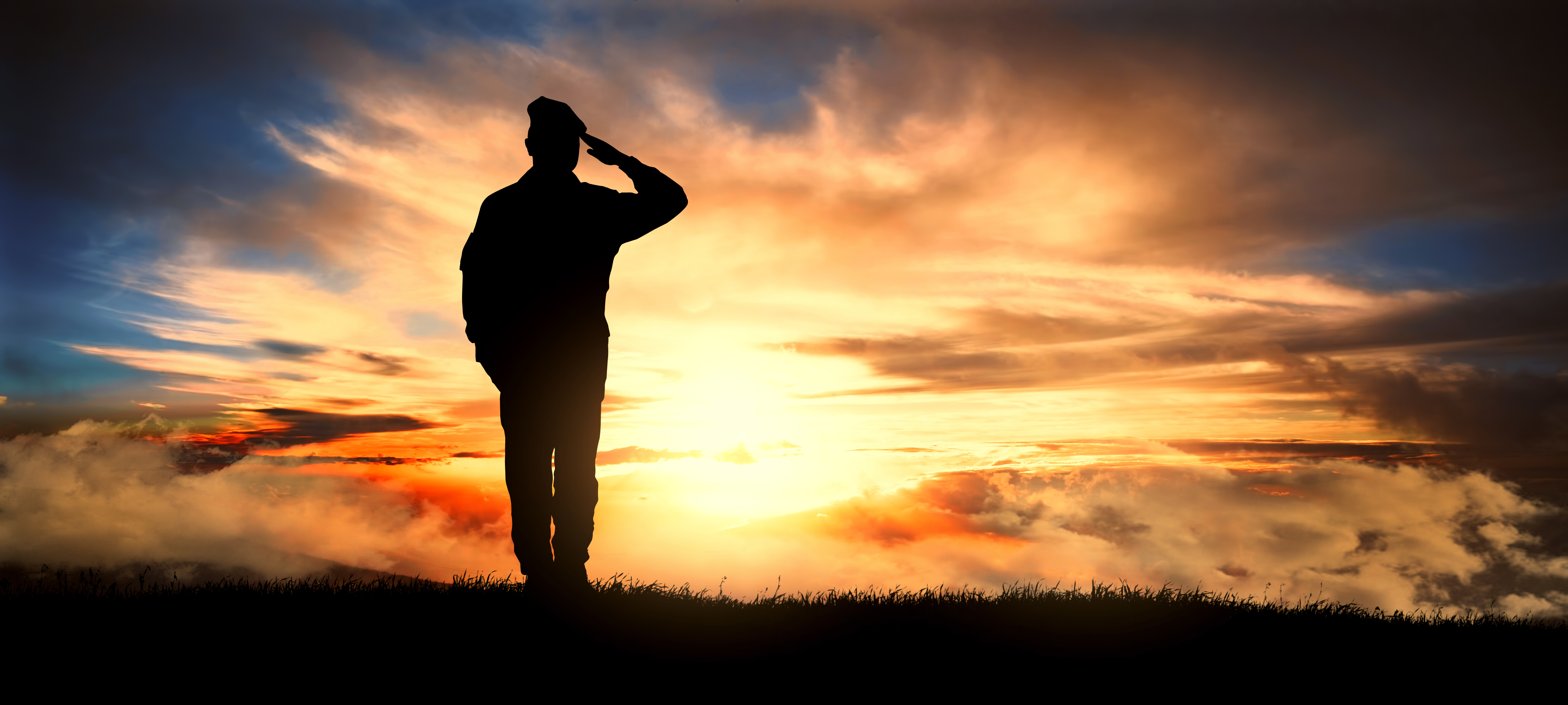 Soldier salute at sunset