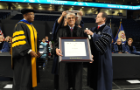 Karl H. Schoenbach, eminent scholar emeritus and professor emeritus of electrical and computer engineering, receives an honorary doctorate of science degree at Old Dominion University's 129th Commencement Exercises. Photo Chuck Thomas/ODU