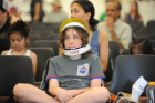 Ten-year-old Mikey Cleaver has his NASA helmet on and is ready to blast off. Photo Chuck Thomas/ODU