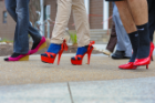 Nearly 150 men on ODU’s campus accepted the challenge and slipped on a pair of heels and show support for ending sexual violence at the 9th annual Walk a Mile in Her Shoes event. Photo Chuck Thomas/ODU