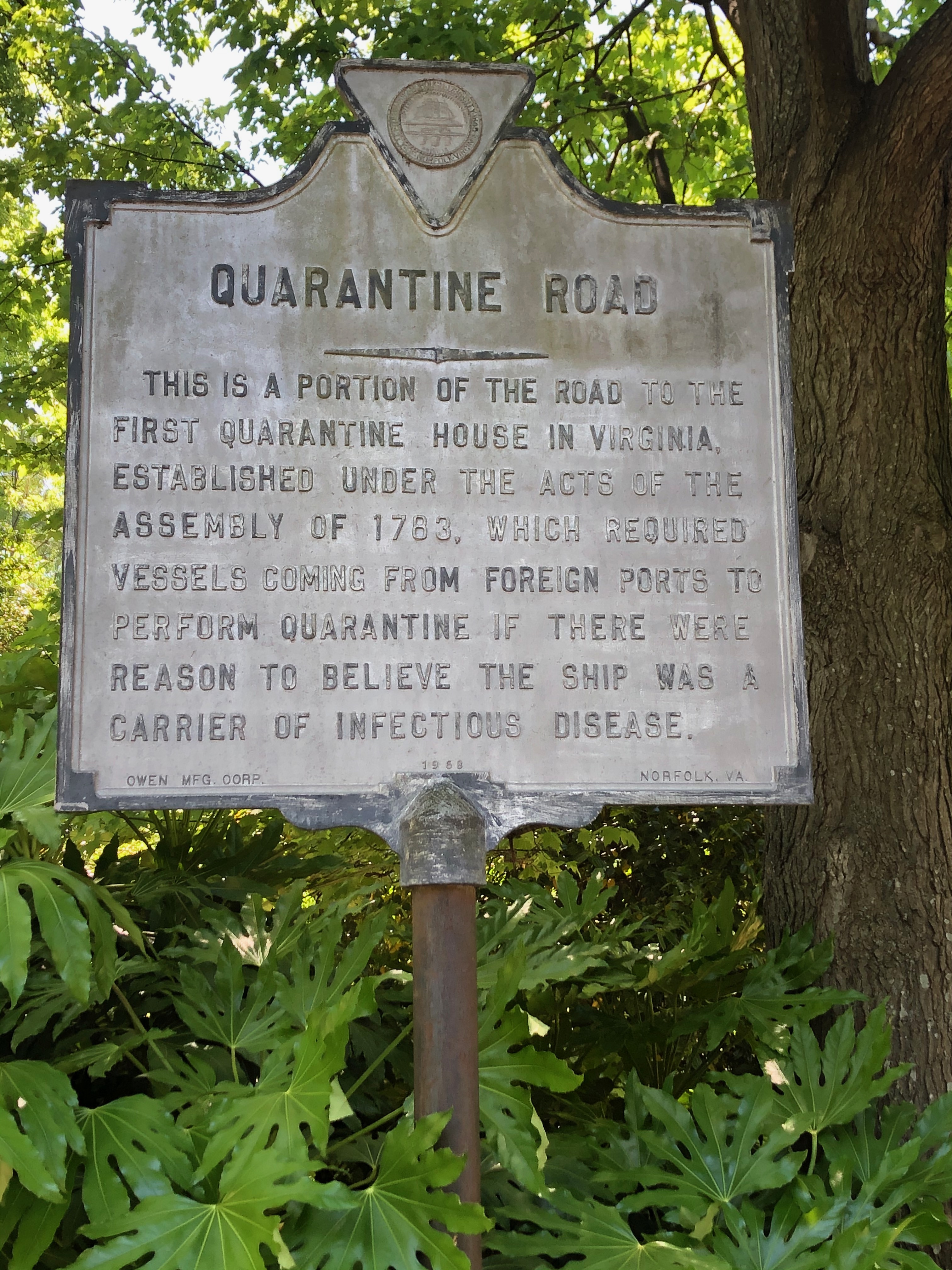 This historical marker noting the former path of Quarantine Road stands in Monarch Gardens on ODU&rsquo;s main campus.