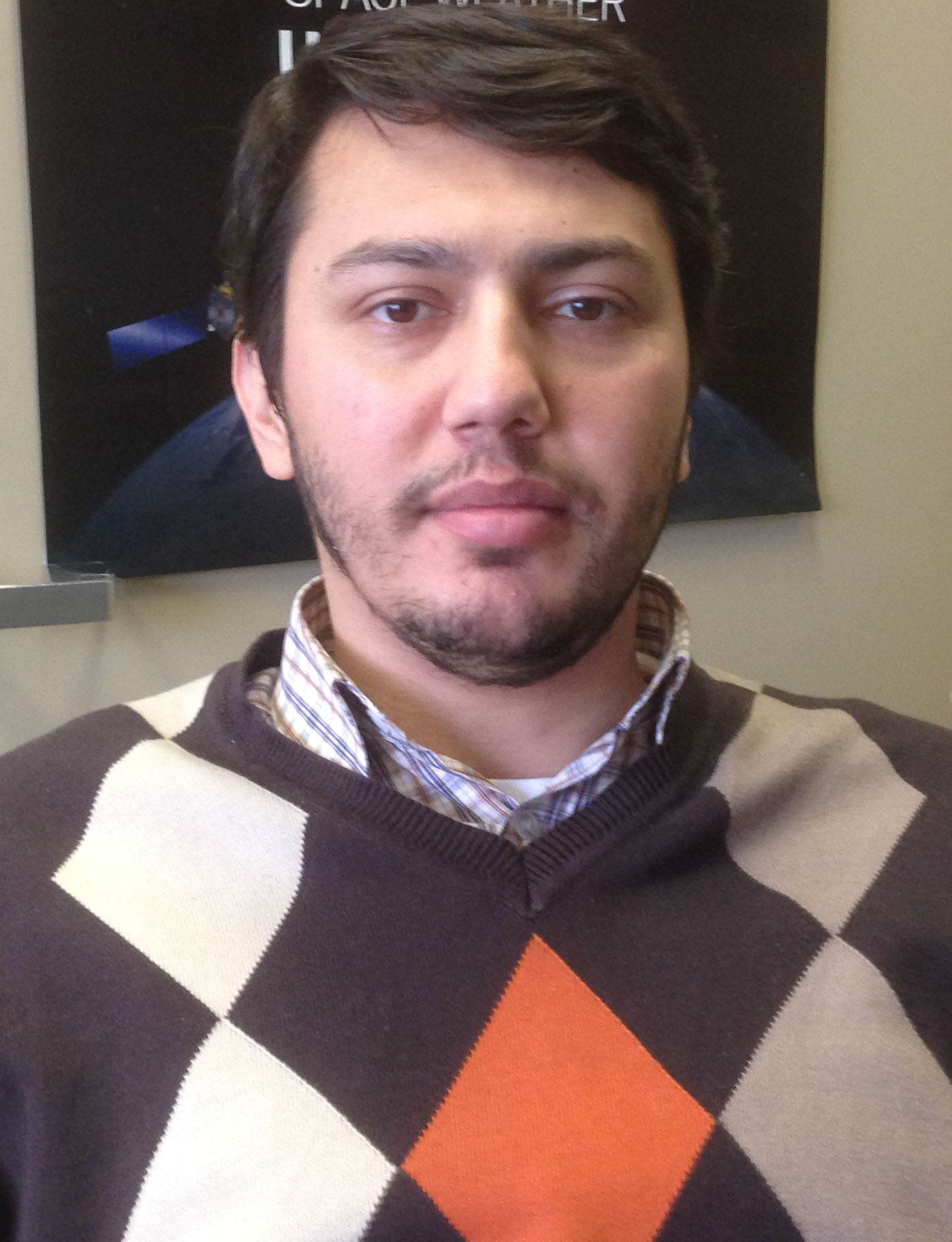 head and shoulders photo of former ODU physics student Serkan Golge