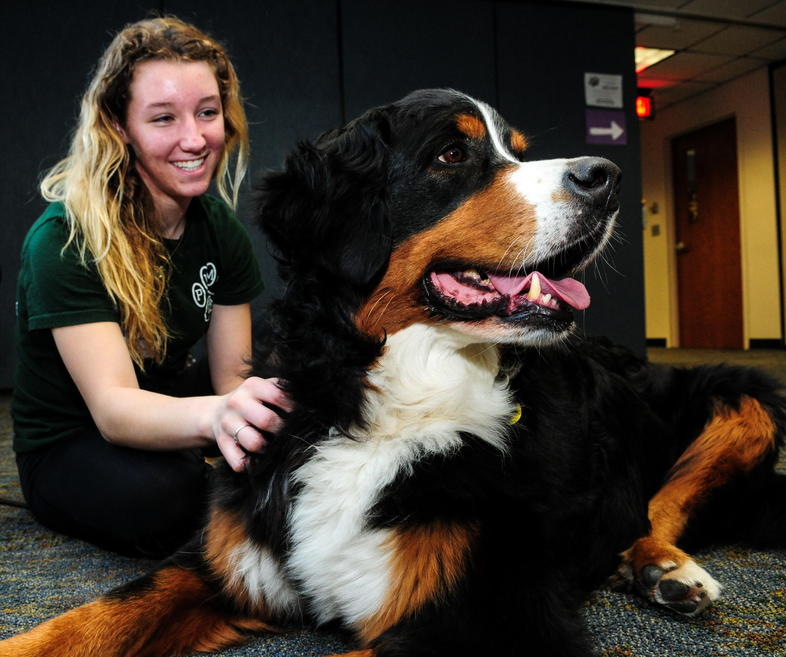 this is a photo of freshman Sydney Shelton and a therapy dog