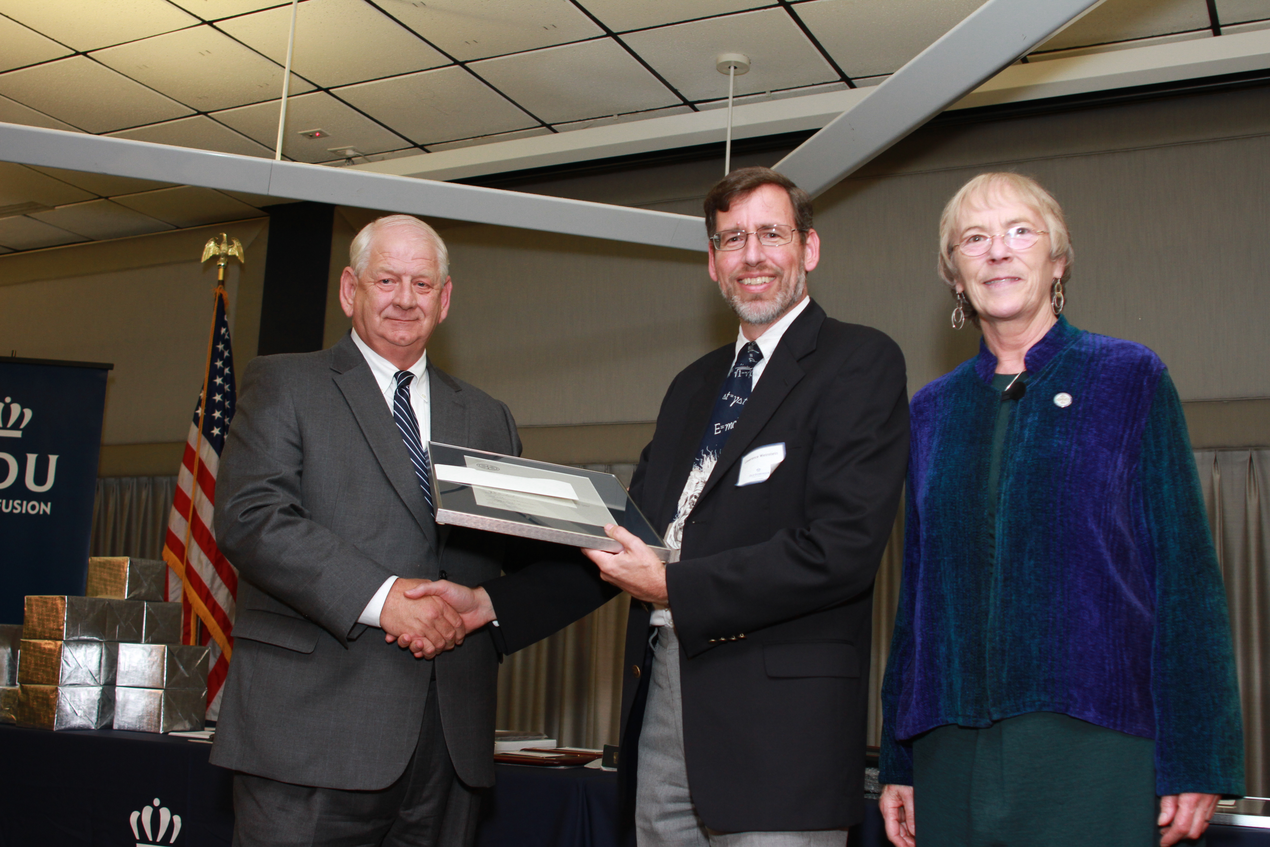 Photo of Lawrence Weinstein receiving faculty award