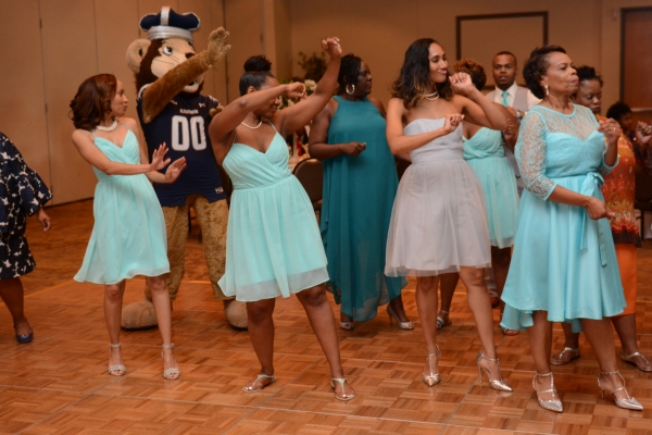 Photo of Big Blue dancing at a wedding