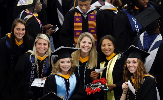 Photo of celebrating graduates