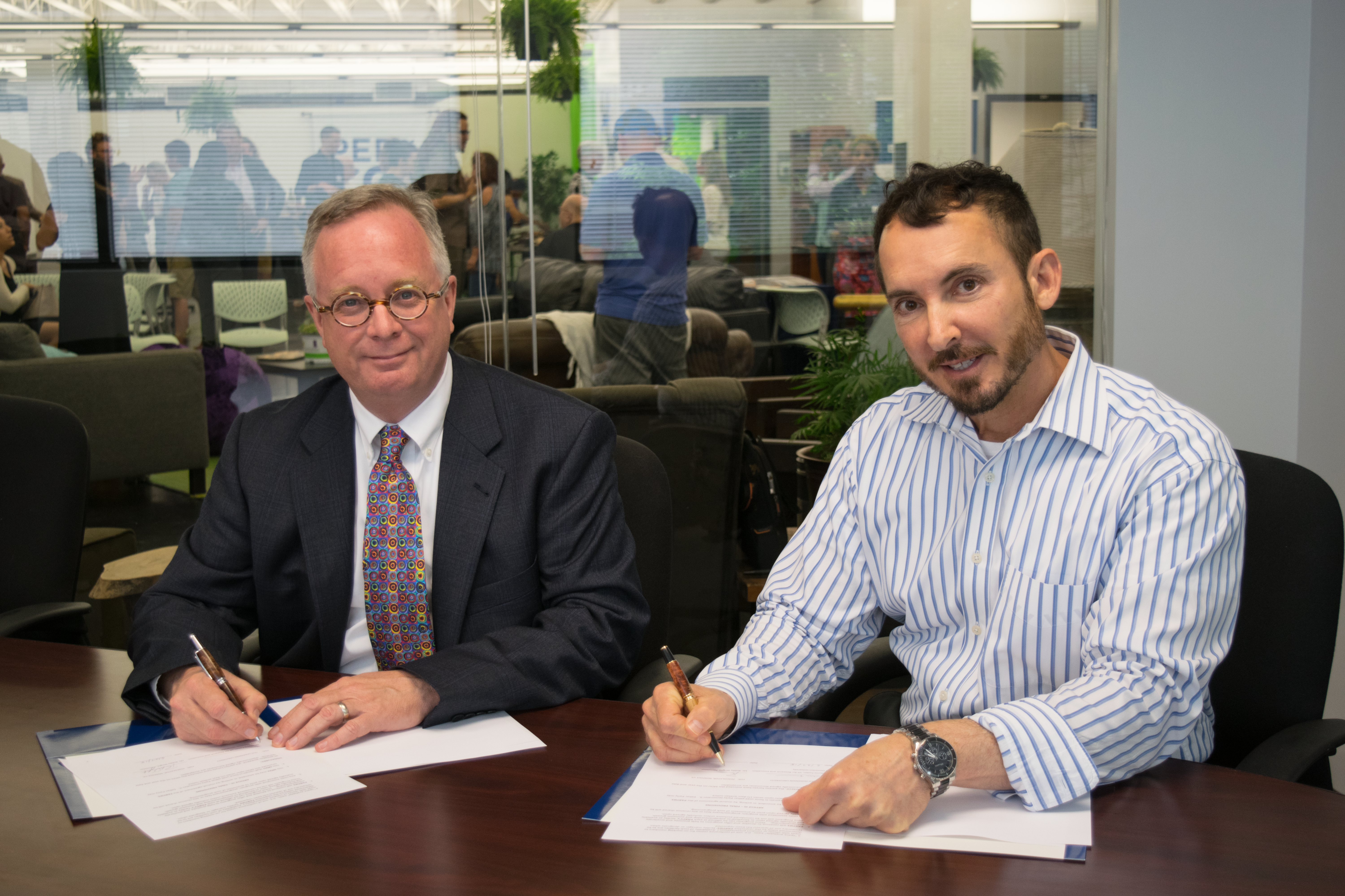 Dr Morris and Bobby Wright signs agreement