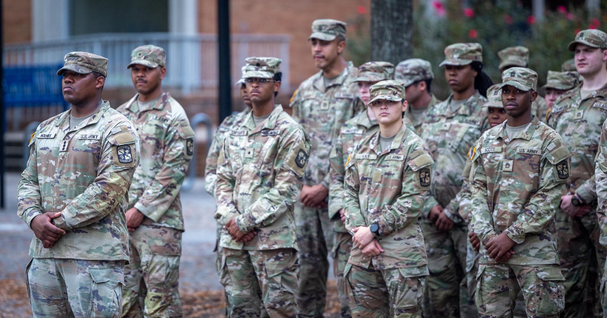 Men and women in uniform.