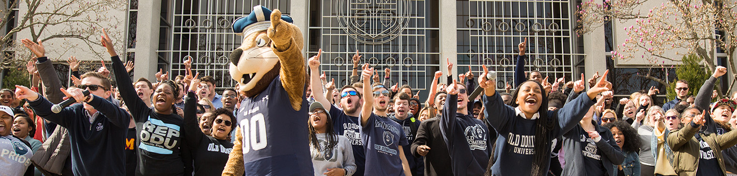 Students cheering with ODU mascot