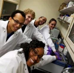Group of biotech students in labcoats