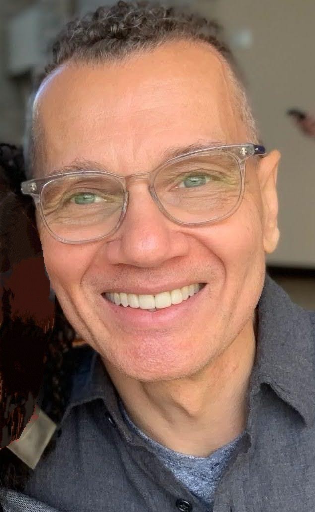 headshot of Tyrone S. Goodwyn smiling