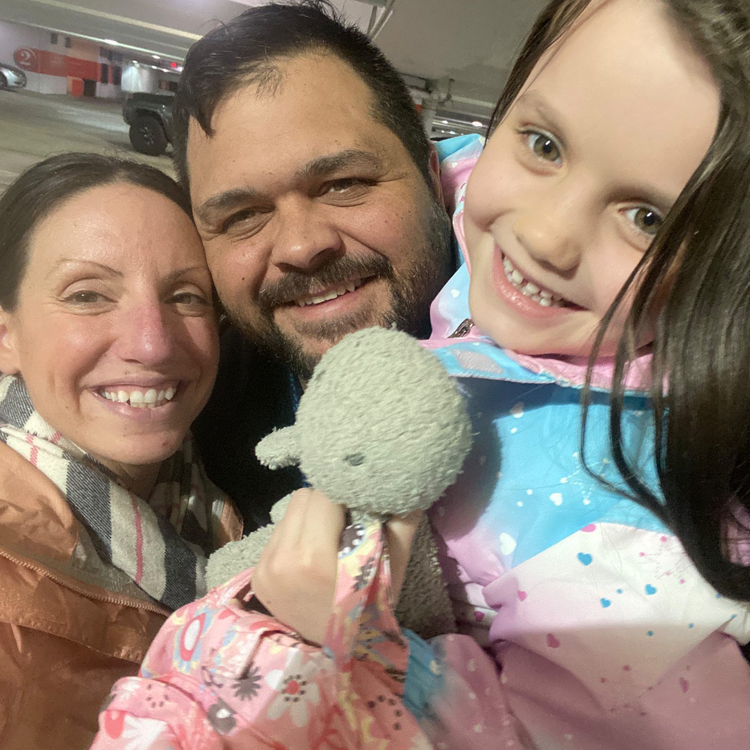 Greg Wilson with his wife and daughter