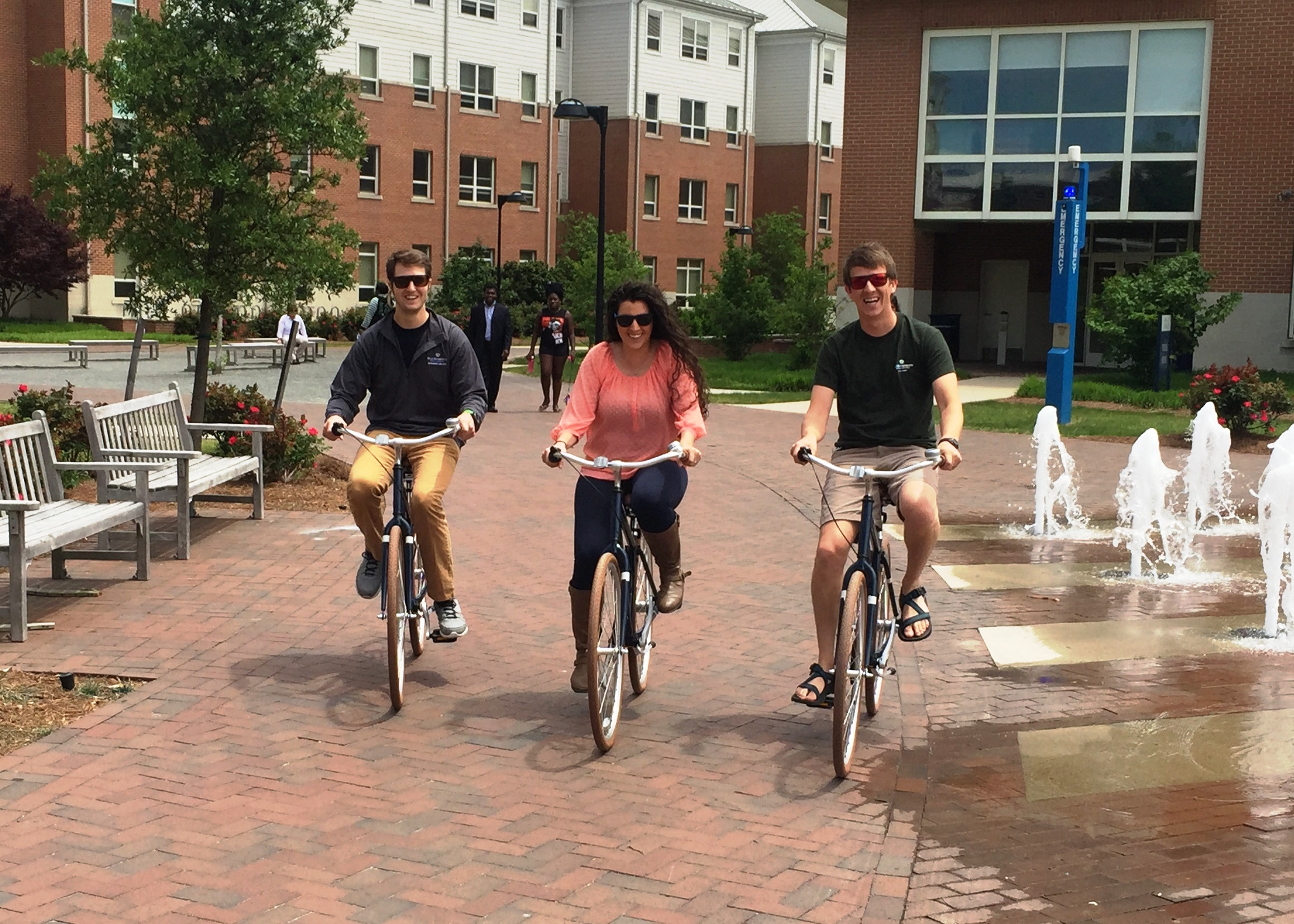 A photo of three Bike ODU participants riding around campus