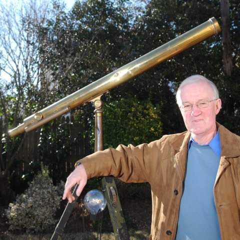 Portrait of a man with a telescope