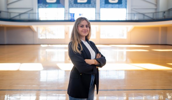 Woman posing in a gymnasium