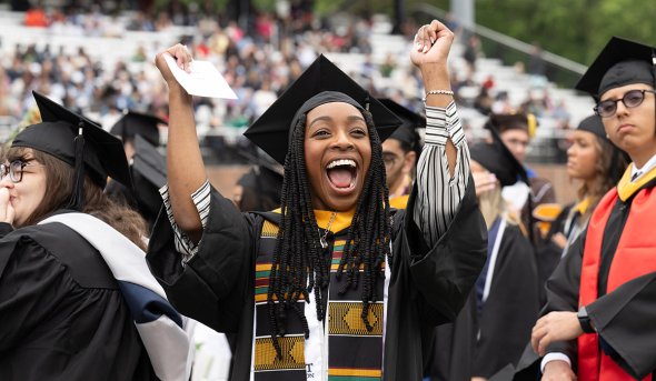 A graduate celebrates during Old Dominion University’s undergraduate Commencement exercise Saturday, May 4, 2024.