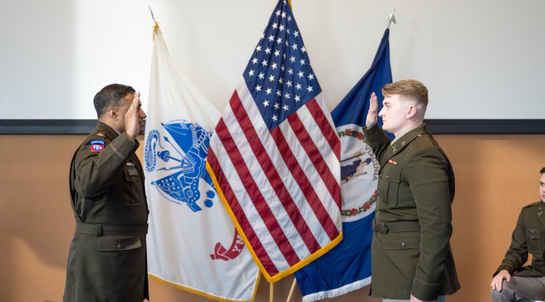 An Army ROTC student is sworn in.