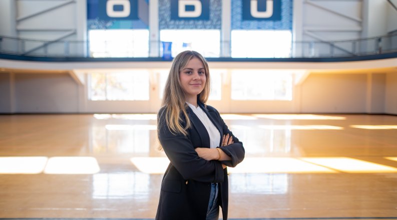 Woman posing in a gymnasium