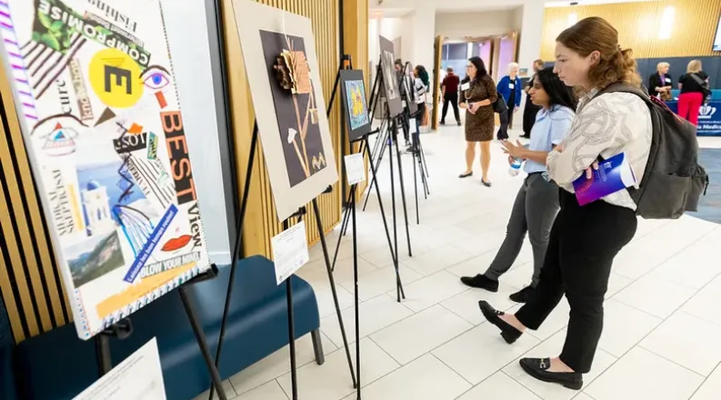 Students attend the Arts for Optimal Health pop-up art show 