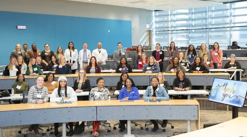Members of IEM at pinning ceremony