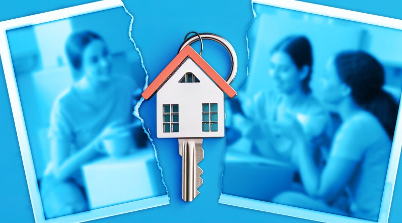 An image of a photo torn in half with a house key in the middle.