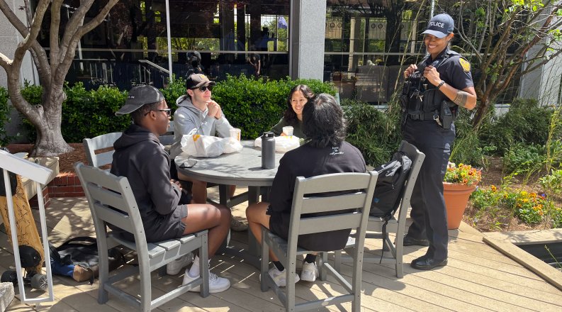 ODU police officer interacts with students