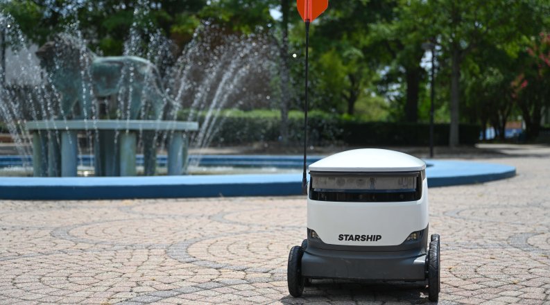 A photo of a food delivery robot on ODU's campus.
