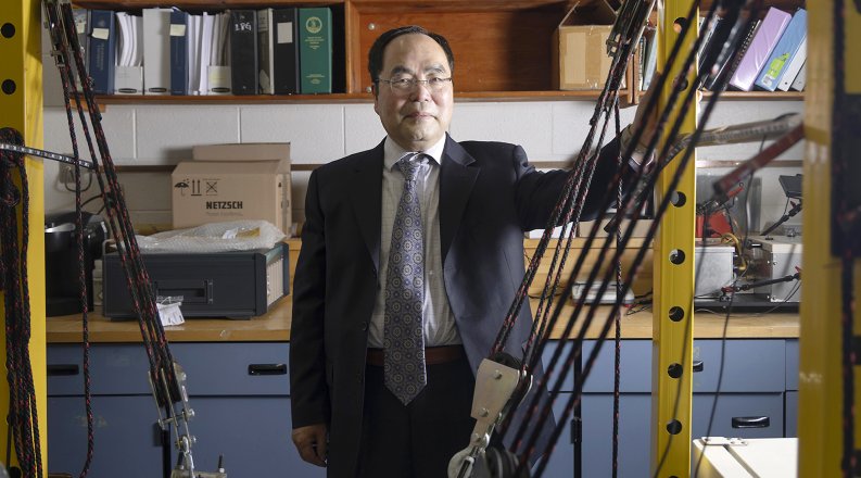 Tian-Bing Xu