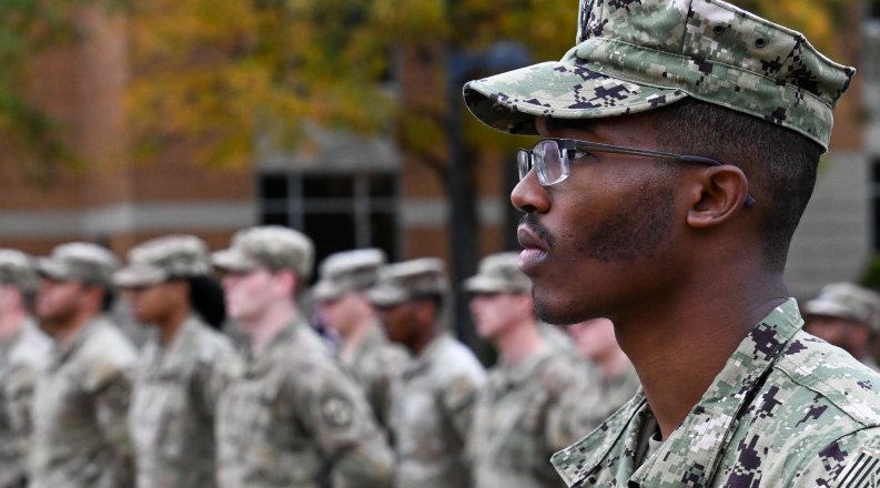 Photo of military personnel in army fatigues