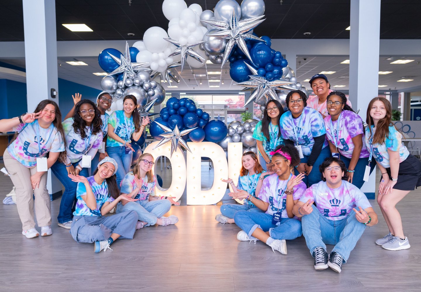 group of odu students under a balloon arch