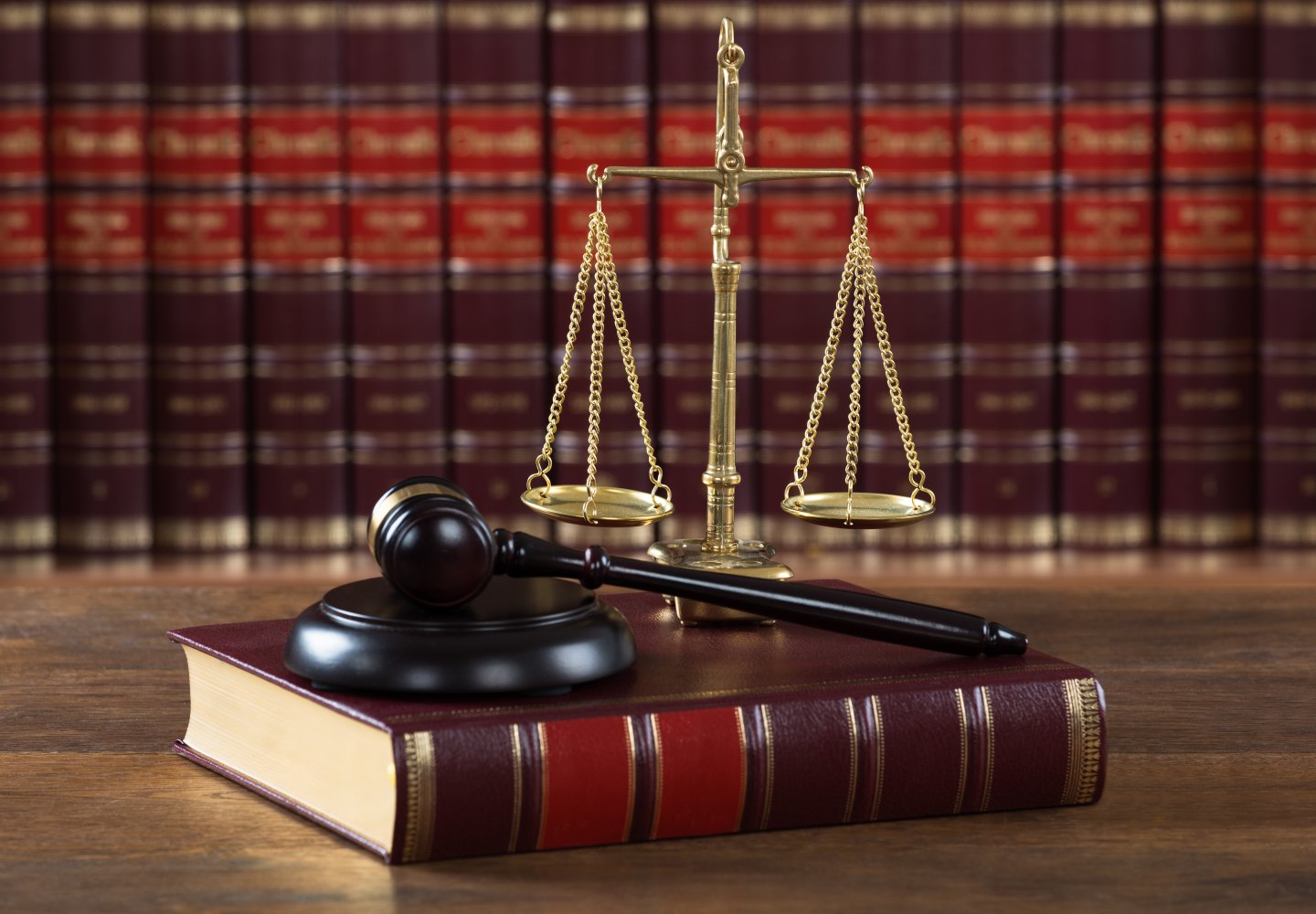 Mallet And Legal Book With Justice Scale On Table