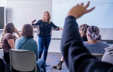 Image of Professor Jennifer Kidd teaching her class in education.