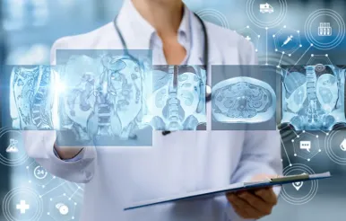 A doctor examines mri images of internal structures of the h