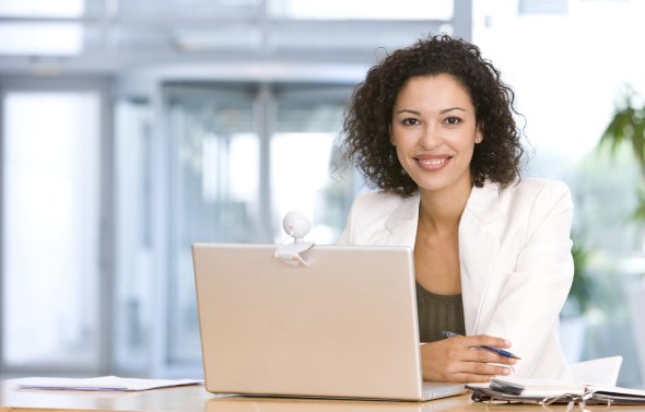 Curriculum Woman at Laptop