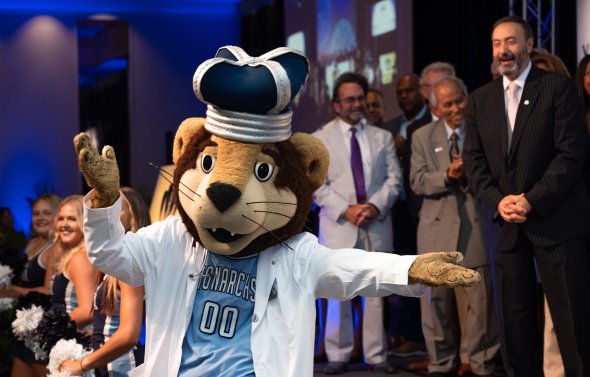 odu mascot in white lab coat