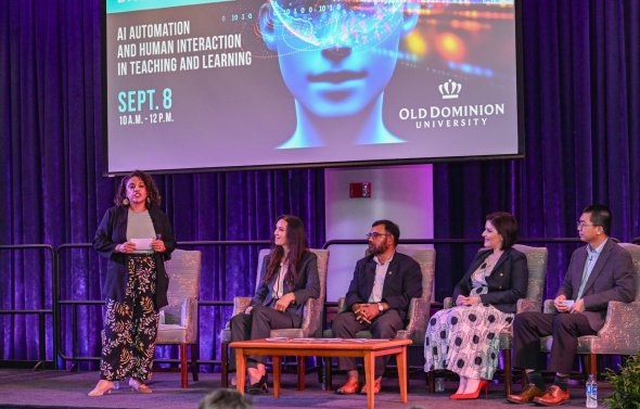 A faculty panel on-stage at ODU's Artificial Intelligence Symposium