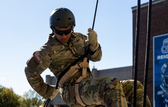 Cadet descending in harness.
