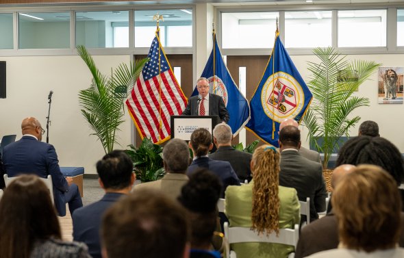 Man speaking at podium