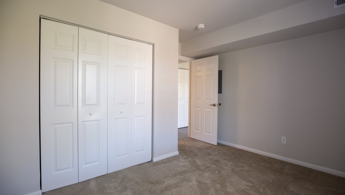 Unfurnished bedroom with closet.