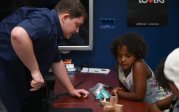 Jacob Lamkhidda talks to 6-year-old Taelor Reynolds