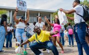 A group of students dance and celebrate as part of ODU's homecoming festivities.