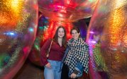Two visitors stop to get their photo taken during Bubble Fest.
