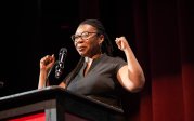 Princess Joy L. Perry speaks at a podium.