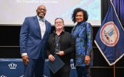 President Brian O. Hemphill and Vice President September Sanderlin with Monarch Values Award winner John Comerford at the Monarch Milestones Celebration on April 10, 2025.