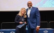 he 2025 Rising Monarch Award winner Kristen Rosser and President Brian O. Hemphill at the Monarch Milestones event April 10, 2025.