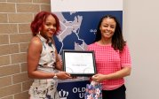 2024 Staff Dream Fund Winner Keesha Lewis, whose dream was to travel to Costa Rica, pictured with Employee Relations Coordinator Brittany Dodson.