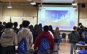 Students watching a video about NASA Wallops Flight Facility.