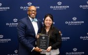 2023 Customer Relations Employee of the Year Linh Nguyen with President Brian O. Hemphill.